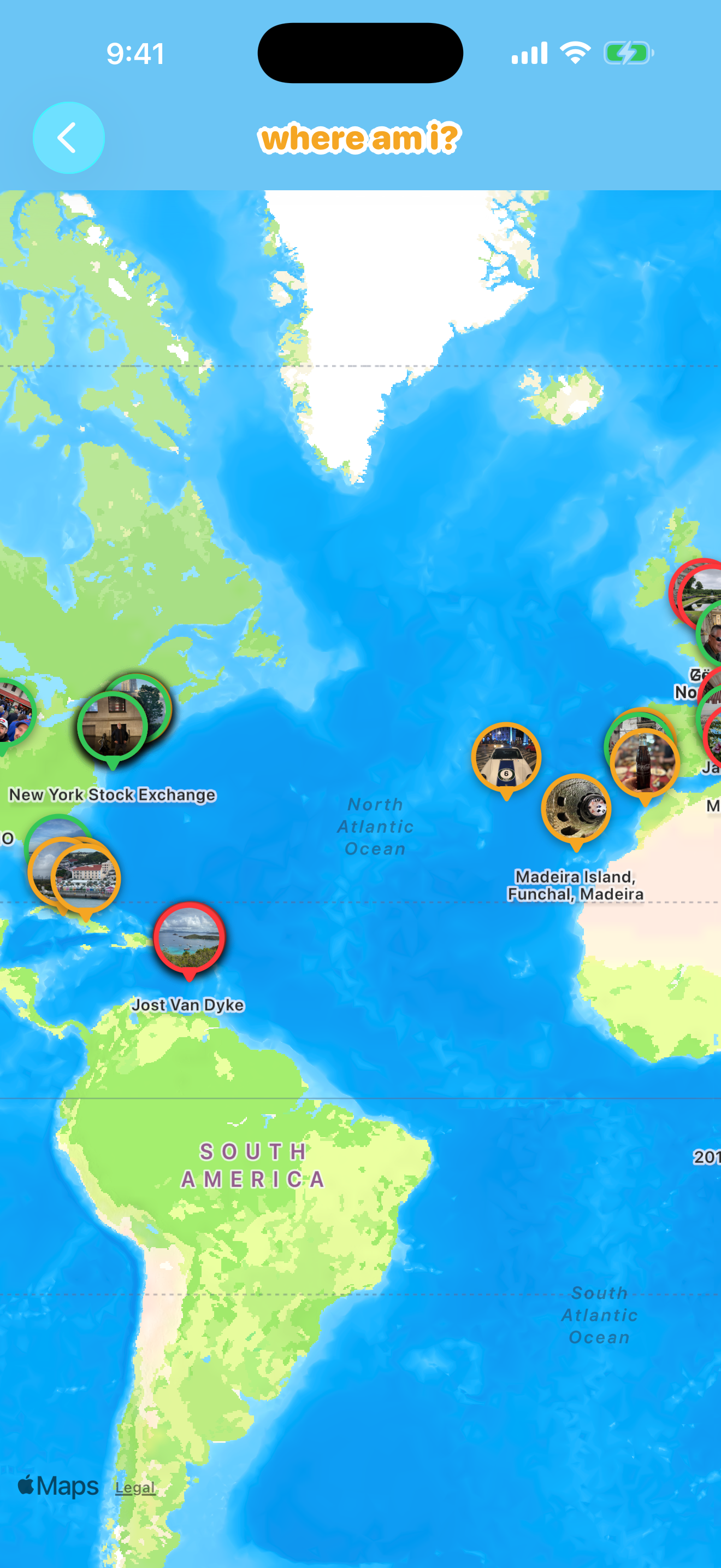 My Map view showing guessed locations pinned around the world